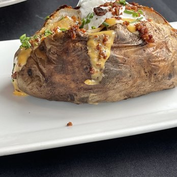 Prime Cincinnati - Loaded baked potato - Steakhouses Near Me - Cincinnati, Ohio Prime Cincinnati - Loaded baked potato - Steakhouses Near Me - Cincinnati, Ohio
