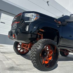The Custom Shop - Custom powder-coated lift kit on 26x16 Fuel Wheels.