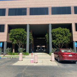 Entrance from the back lot. We are suite 100, first door on the left.