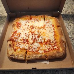 a pizza in a pizza box