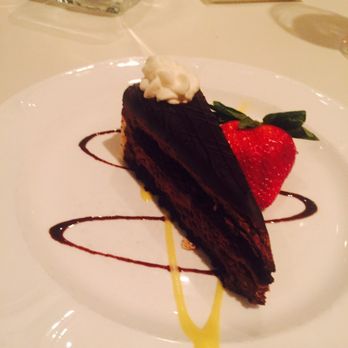 Bentley's Restaurant - Chocolate cake with a strawberry drizzle - French Near Me - Charlotte, North Carolina