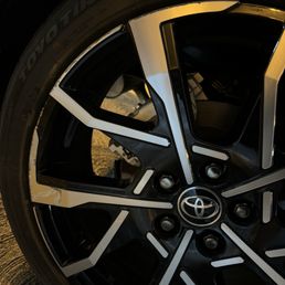 Before - scrape on one spoke and scratches along a quarter of the rim.