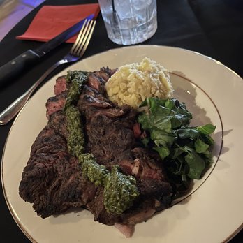 Alchemi - USDA NY strip with Chimichurri, red mashed potatoes, Swiss chard - American Near Me - Royal Oak, Michigan Alchemi - USDA NY strip with Chimichurri, red mashed potatoes, Swiss chard - American Near Me - Royal Oak, Michigan