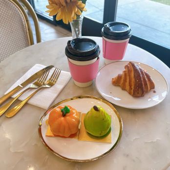 Rocheli Patisserie - Pumpkin and pear fruit mouse desserts with a croissant and drinks. - Bakeries Near Me - Austin, Texas