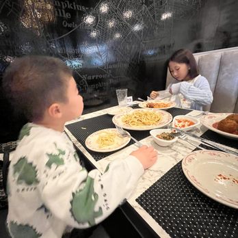 Carbonara - my kids just chowing down. - Italian Near Me - Arlington, Virginia