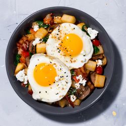 Maple Street Biscuit Company - McKinney - Hash Bowl: Crispy potatoes, bacon, peppers, onions, mushrooms, goat cheese, two eggs your way, topped with everything bagel seasoning.