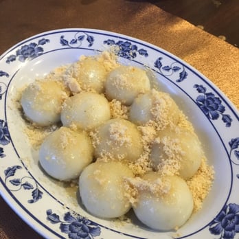 Liu's Shanghai - Dry sesame rice ball with peanut sugar on top. i know this isn't the most flattering photo; but it's delicious - Shanghainese Near Me - Brooklyn, New York