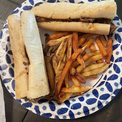 Penn Station East Coast Subs - Large Philly Cheesesteak and an order of fries.