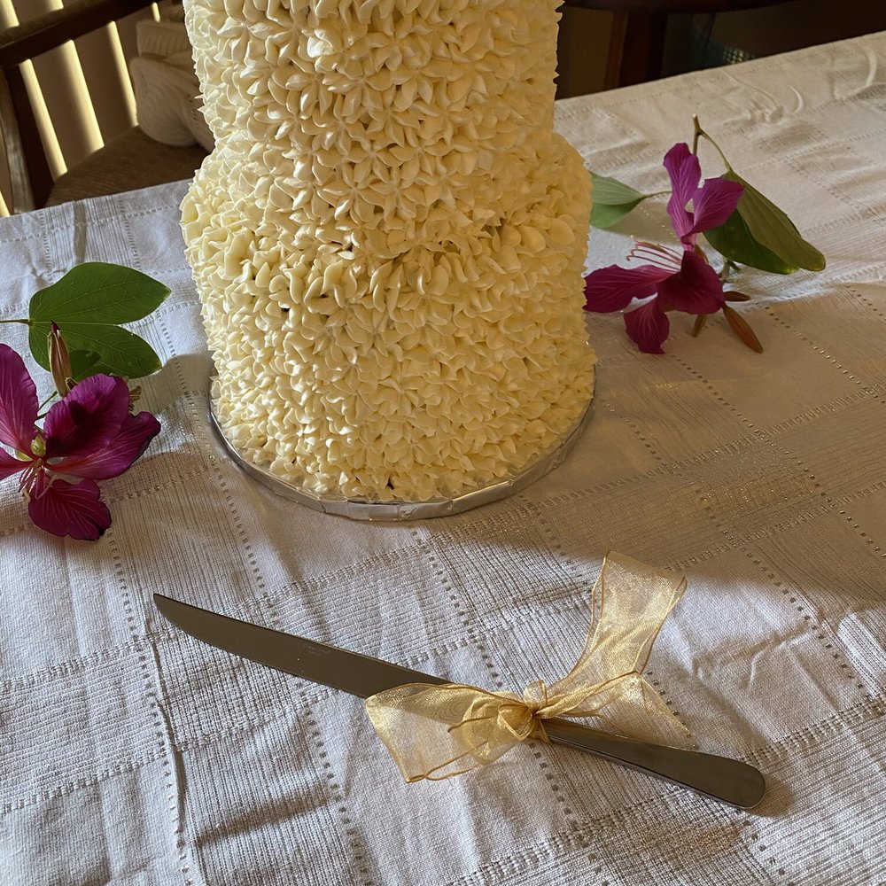 Taste & Sea Cakery - a knife and a cake on a table - Cupcakes Near Me - Carlsbad, California Taste & Sea Cakery - a knife and a cake on a table - Cupcakes Near Me - Carlsbad, California