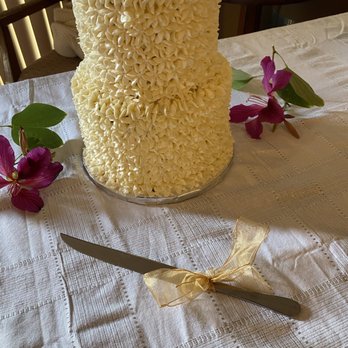 Taste & Sea Cakery - a knife and a cake on a table - Cupcakes Near Me - Carlsbad, California Taste & Sea Cakery - a knife and a cake on a table - Cupcakes Near Me - Carlsbad, California