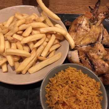 Nando's - Full chicken platter dinner with spicy rice and chips - Chicken Shop Near Me - Reading, RDG Nando's - Full chicken platter dinner with spicy rice and chips - Chicken Shop Near Me - Reading, RDG