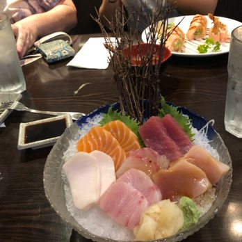 Corner Sushi - This is how the sashimi regular dinner is served. And no you don't eat the twigs. - Sushi Bars Near Me - St. Augustine, Florida Corner Sushi - This is how the sashimi regular dinner is served. And no you don't eat the twigs. - Sushi Bars Near Me - St. Augustine, Florida