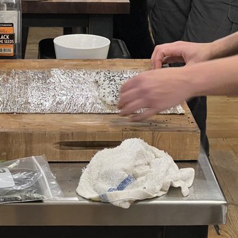 The Chopping Block - The bamboo mat wrapped in cellophane for easy clean up - Specialty Food Near Me - Chicago, Illinois