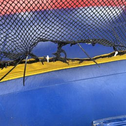 Ripped net and fixed with sharp ties
