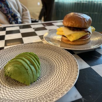 Funny Library Coffee Shop - Breakfast sandwich with a side of avocado - Coffee & Tea Near Me - Nashville, Tennessee