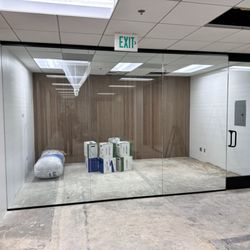 Allusions Glazing - All glass wall and hurculite door