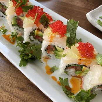 Cocoro Bistro - Scallop roll that I doctored up with hot chili oil and fresh cilantro. I liked it much more! - Sushi Bars Near Me - Stockton, California Cocoro Bistro - Scallop roll that I doctored up with hot chili oil and fresh cilantro. I liked it much more! - Sushi Bars Near Me - Stockton, California