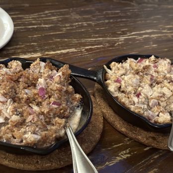Mama Fina's - Squid sisig left and pork sisig on right.  They are similar.  Pork is my fav though! - Filipino Near Me - New York, New York