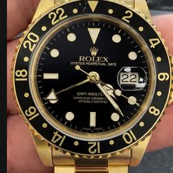 Marina Bay Watch Company - 18k gold Rolex GMT freshly serviced