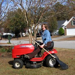 Southern Lawn Equipment - Lazy girl raking!