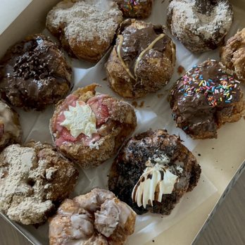 Parlor Doughnuts - I swear we had one of every flavor, but believe it or not we didn't! They have so many to choose from - Coffee & Tea Near Me - Panama City Beach, Florida