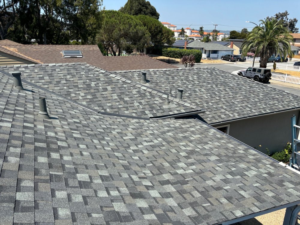 Slide of Signature Roofing