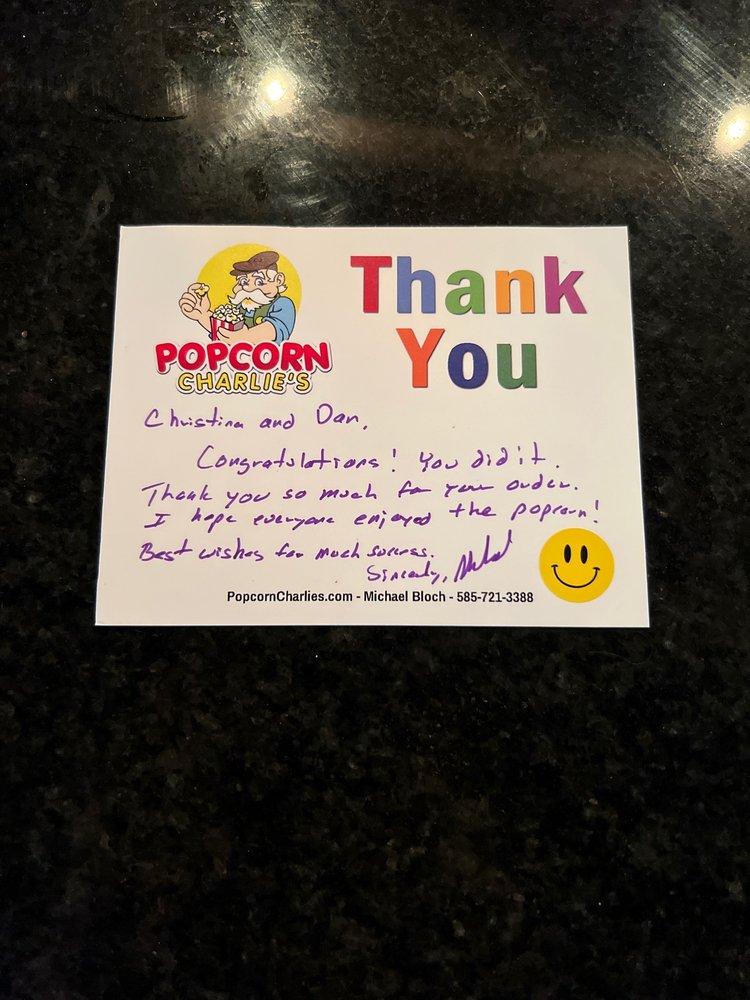 Popcorn Charlie's Logo