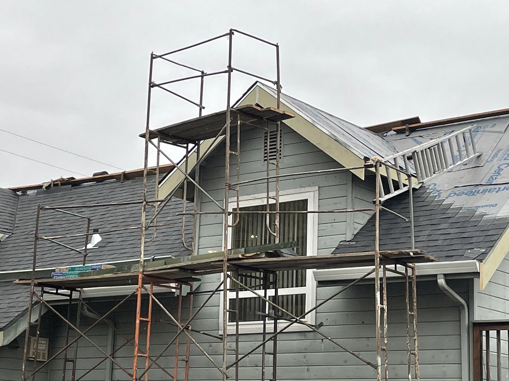 Slide of Al Jr's Roofing