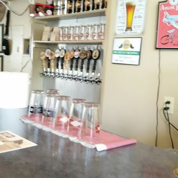 Big Muddy Brewing - a bar with a bunch of glasses - Breweries Near Me - Murphysboro, Illinois Big Muddy Brewing - a bar with a bunch of glasses - Breweries Near Me - Murphysboro, Illinois