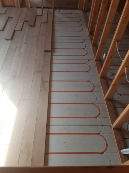 Slide of Rad.King Radiant Heat Contractors