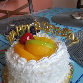 GuatePan Latin American Bakery - Pineapple filled vanilla cake with a coconut exterior topped with glazed peaches, apple, and strawberries. - Latin American Near Me - Hightstown, New Jersey GuatePan Latin American Bakery - Pineapple filled vanilla cake with a coconut exterior topped with glazed peaches, apple, and strawberries. - Latin American Near Me - Hightstown, New Jersey