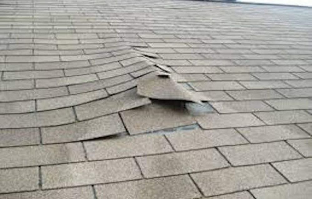 Slide of Acadiana Roofing