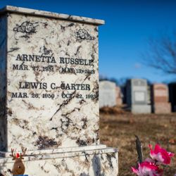 Light After Death Monuments - Marble headstone, with etched doves on the top corners.