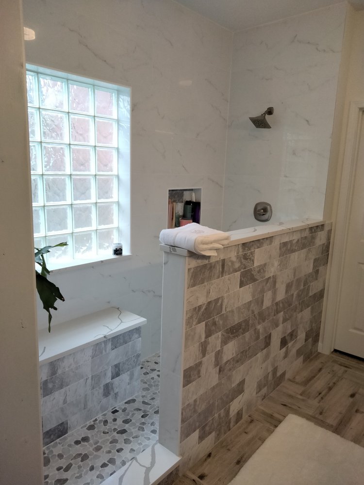 Slide of Hamma Roof & Construction