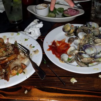 Salt Pub - After. Look at all those clam shells. I swear each had 2 clams! There were clams everywhere! - New American Near Me - Ilwaco, Washington Salt Pub - After. Look at all those clam shells. I swear each had 2 clams! There were clams everywhere! - New American Near Me - Ilwaco, Washington