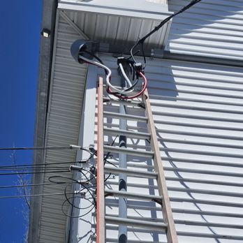 J Malcolm Electric - Connected the new service feeders to the utility lines to restore power to the building. - Electricians Near Me