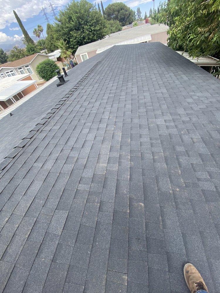 Slide of ARG Roofing Services