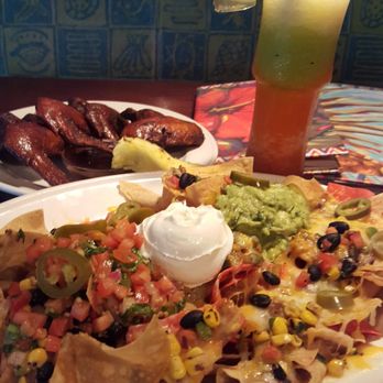 Bahama Breeze - Chicken Nachos & Burnt Jerk Chicken Wings - Bars Near Me - Schaumburg, Illinois Bahama Breeze - Chicken Nachos & Burnt Jerk Chicken Wings - Bars Near Me - Schaumburg, Illinois