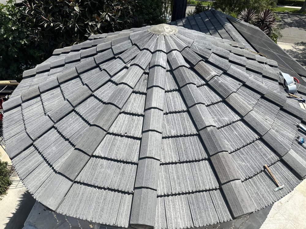 Slide of Twins Roofing