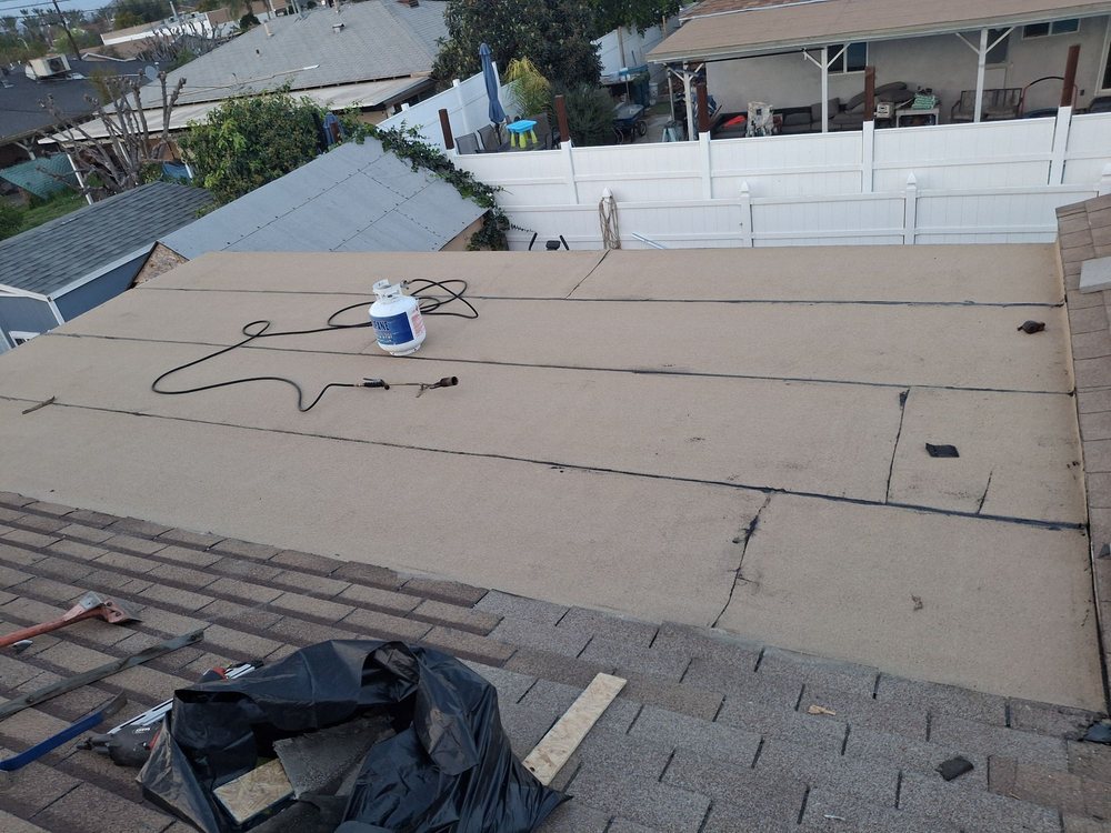 Slide of Alexander’s Roofing