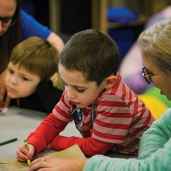 A Hopebridge kiddo working with RBTs on ABA Therapy.