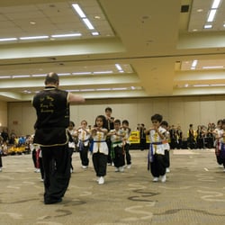 Tat Wong Kung Fu Academy - Young students doing a group Kung Fu performance at the tournament