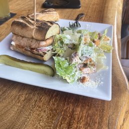 Salmon sandwich with Caesar salad Salmon sandwich with Caesar salad