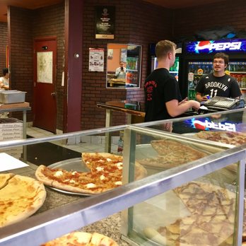 I Love New York Pizza - a man serving pizza - Pizza Near Me - Troy, New York