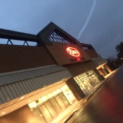 Roses Store - Store front, early morning.