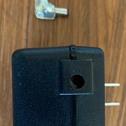 The Northern Edge - This power supply has seen better days. Pin to hold the cord in is completely broken off, and structure inside seems to be cracked.