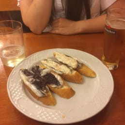 Spider-crab and olive tapenade anchovies, with a glass of beer and txakoli (a basque white wine) Spider-crab and olive tapenade anchovies, with a glass of beer and txakoli (a basque white wine)