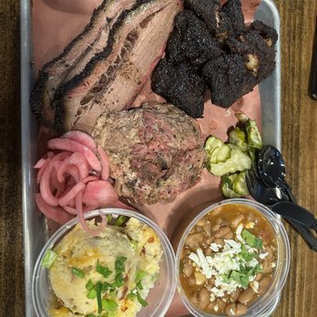 Hurtado Barbecue - Three Meat Plate. Brisket, Pulled Pork, Bacon Burnt Ends, Brisket Beans, Loaded Potatoes - Barbeque Near Me - Arlington, Texas
