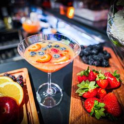 Koochini - Crafted Cocktails to Elevate Your Evening - Sip on our signature cocktails, expertly mixed by our talented bartenders. Whether you prefer a