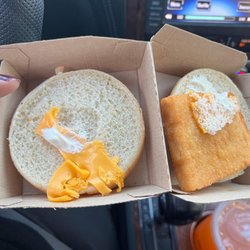 McDonald's - Half slice of cheese One pump of tarter sauce. Dry fish square.